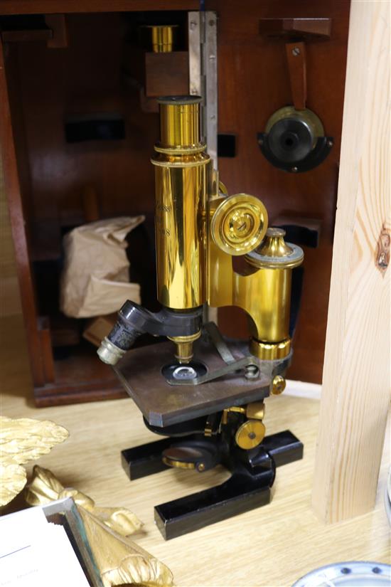 A Carl Zeiss Jena lacquered brass and black enamelled microscope, No. 16808, 37cm high